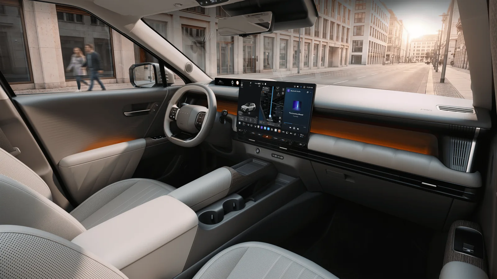 Planche de bord du nouveau Hyundai Tucson vue par la portière passager, avec le grand écran central Pleos Connect