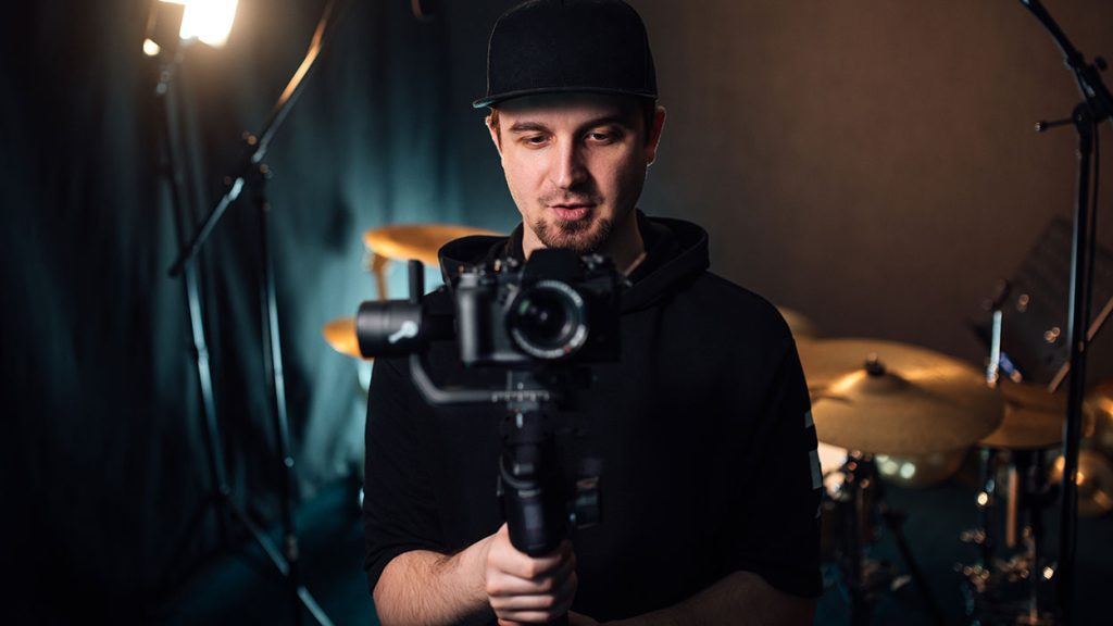videographer filming at a recording studio 2023 11 27 04 57 33 utc